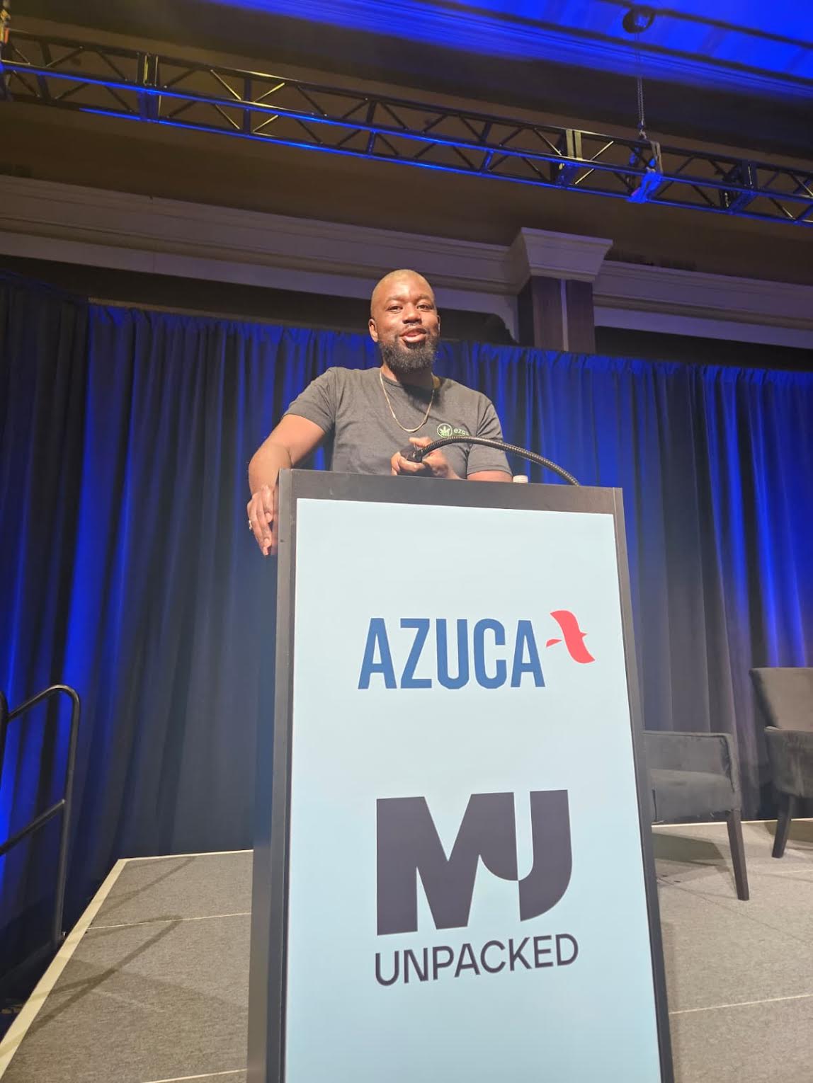 Mackenten speaking at MJ Unpacked / AZUCA